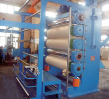Machine de calandrage textile à cinq rouleaux
